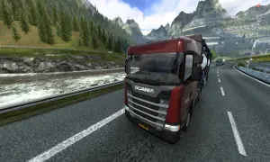 Camión Scania rojo en una carretera montañosa, disfrutando de la experiencia de Euro Truck Simulator 2 en PS5.