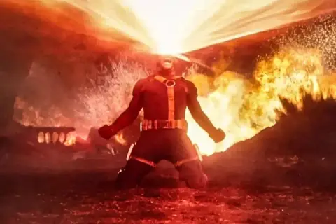 Ciclope de los X-Men libera su rayo óptico en medio de una explosión.