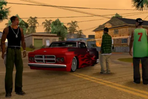 CJ y sus amigos planean cómo usar trucos de GTA San Andreas PS2 para conseguir ese coche rojo con llamas.