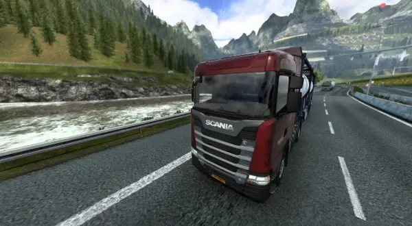 Camión Scania rojo en una carretera montañosa, disfrutando de la experiencia de Euro Truck Simulator 2 en PS5.