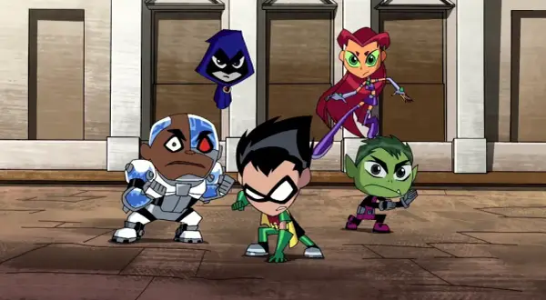 Los new teen titans, Robin, Cyborg, Raven, Starfire y Beast Boy, se preparan para la acción.