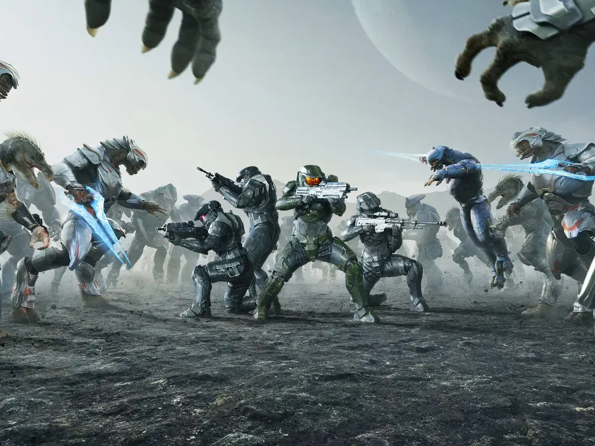 Soldados de Halo en combate contra alienígenas, con un planeta al fondo.