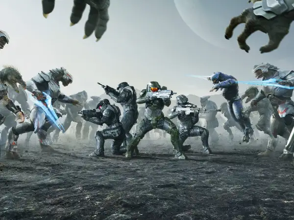 Soldados de Halo en combate contra alienígenas, con un planeta al fondo.