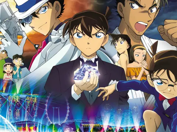 El **detective Conan final** se acerca. Conan sostiene un cristal mientras otros personajes observan, con una ciudad iluminada de fondo.